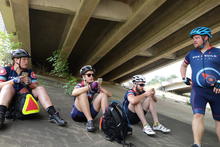 Resting in shade under the highway. 